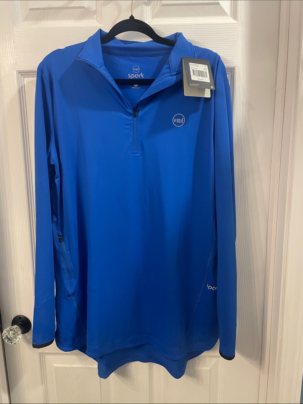 Veil Spark performance quarter zip top with one zip pocket and thumb holes-  NWT